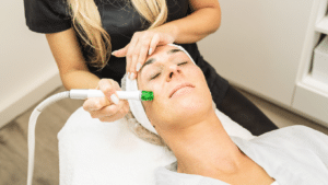 woman receiving hydrafacial